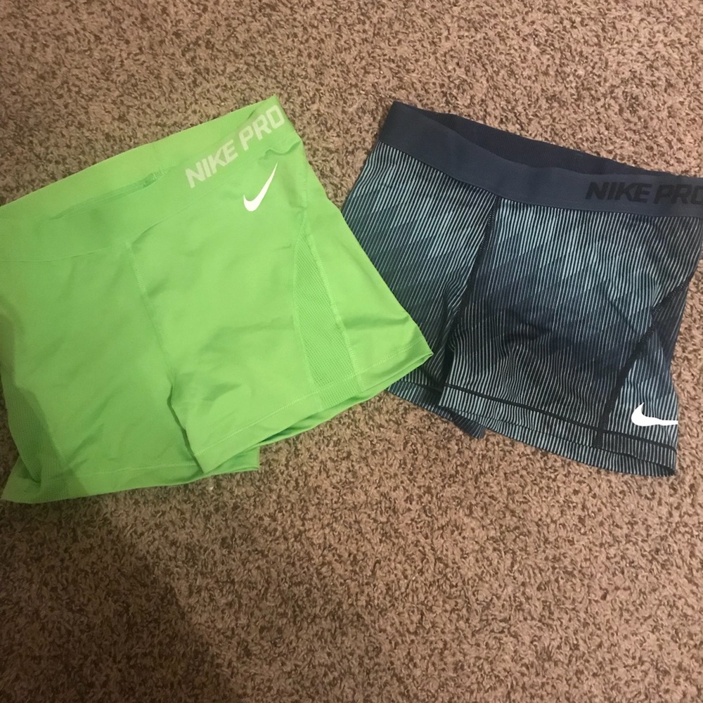 Two Nike Pro shorts